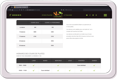 Tablette affichant tarifs et horaires Studio Pilates Toulouse